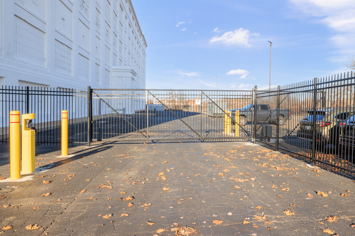 Secured perimeter gate at facility entry point